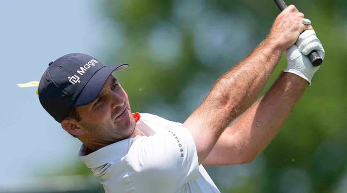 Denny McCarthy watches a shot at the 2023 Memorial Tournament.